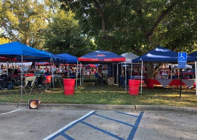 A red and blue sea of tents ready for a great day in the Grove.